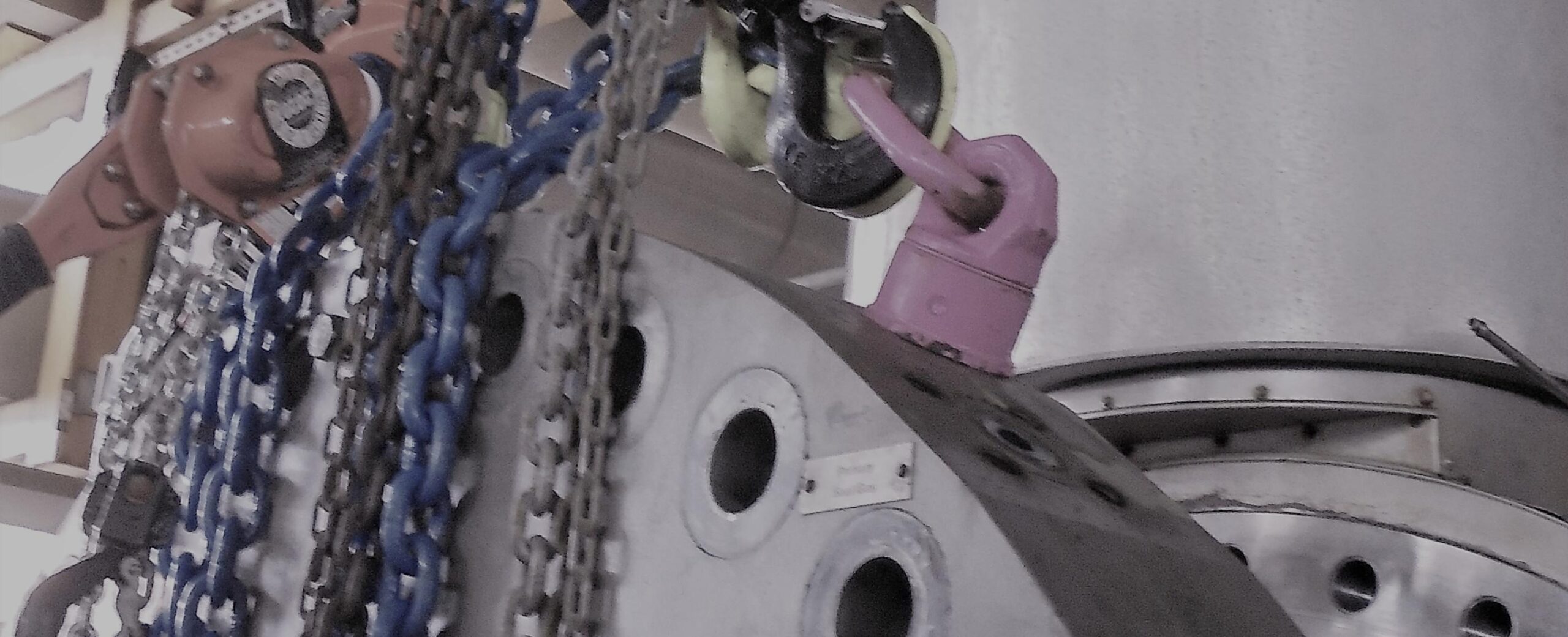 means the use of mechanical load shifting equipment and associated gear